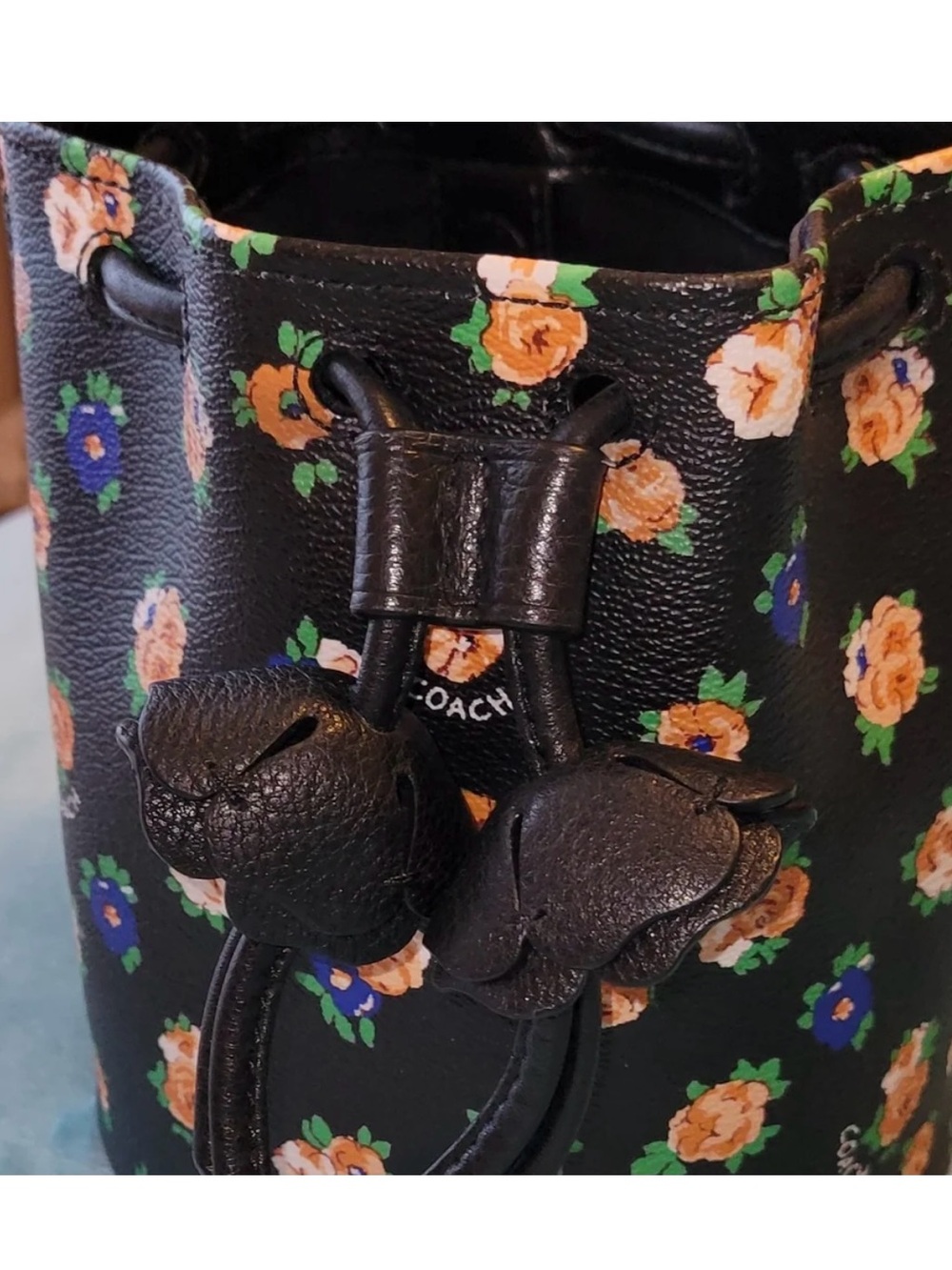 COACH Black Floral Drawstring Bucket Bag